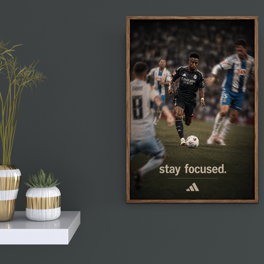 Vinicius Jr Stay Focused football poster mockup on dark wall, primary view